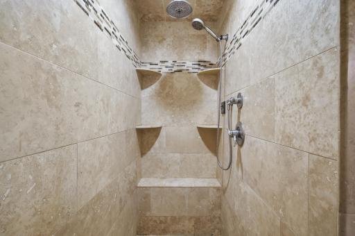 Oversized walk in tile steam shower with overhead rain shower head