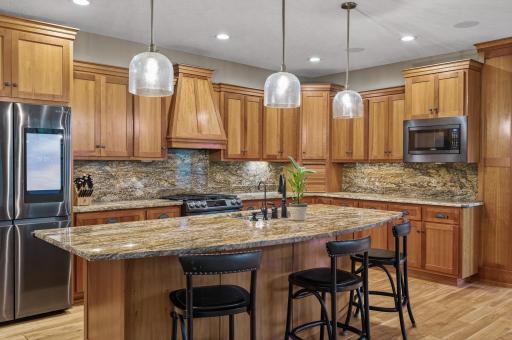 Gorgeous wood cabinets and oversized island