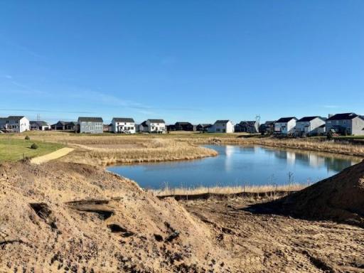 What a View! Picture taken out the window of 6205 Jensen. A beautiful pond view. Irrigation, sod + landscaping package all INCLUDED in price.