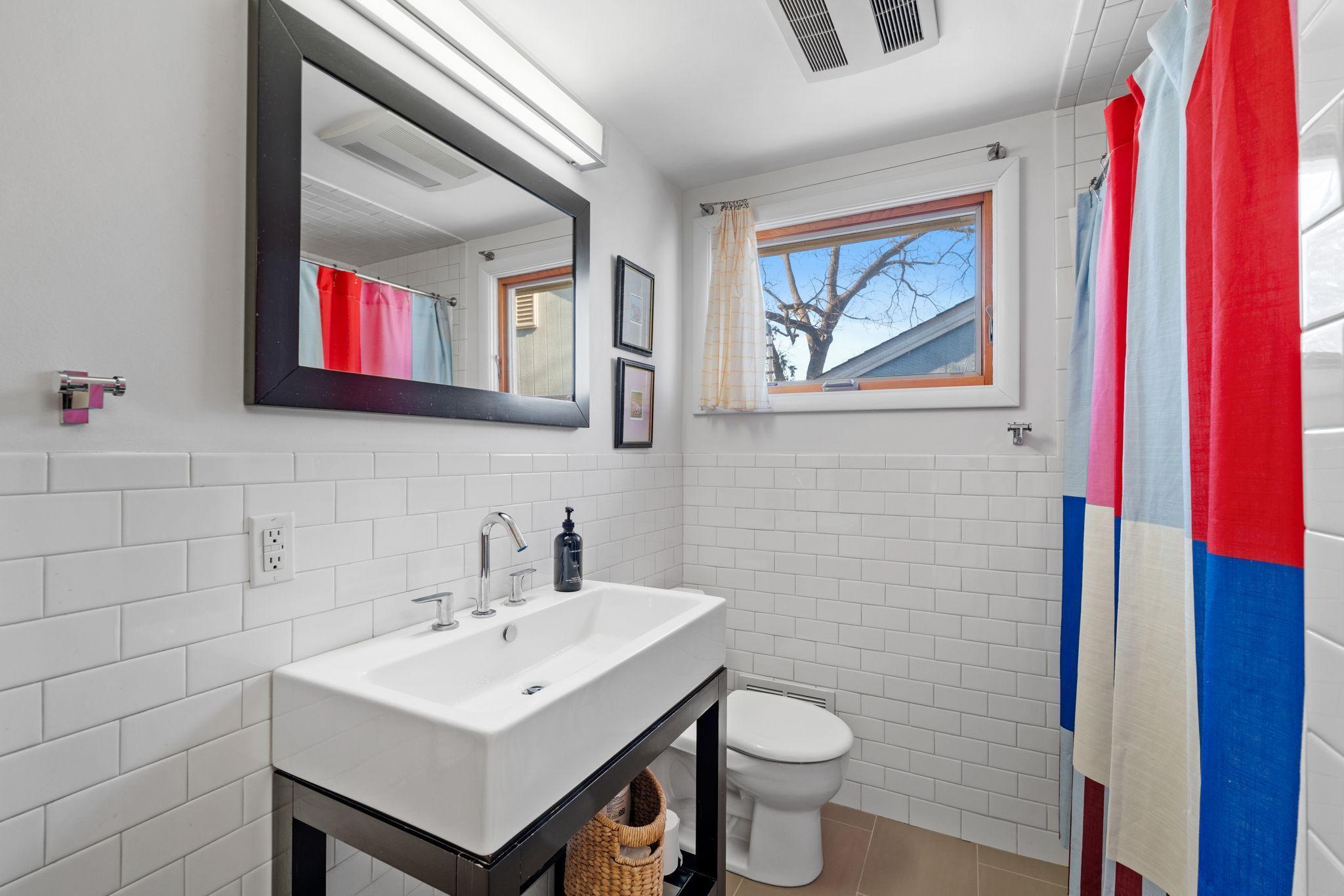 The main level bathroom has been heavily updated.