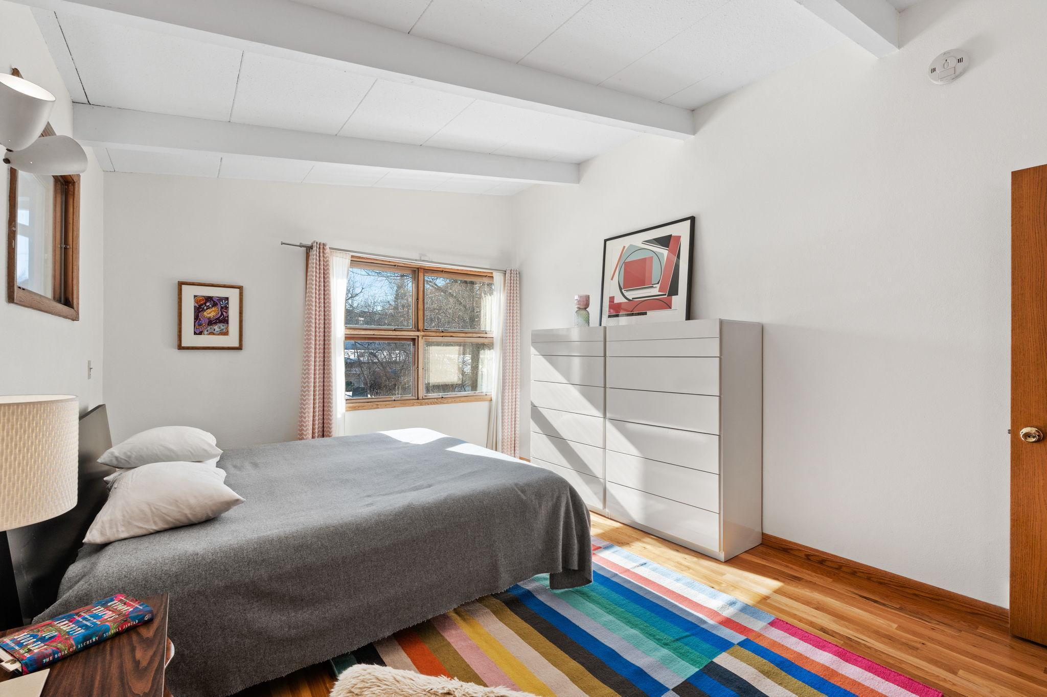 The primary bedroom is vaulted and has easy ensuite potential.