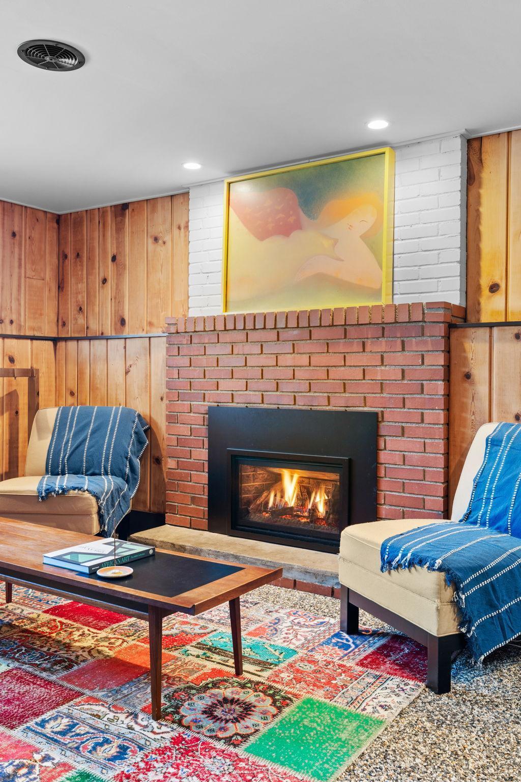 The newer gas fireplace is the heart of this level.