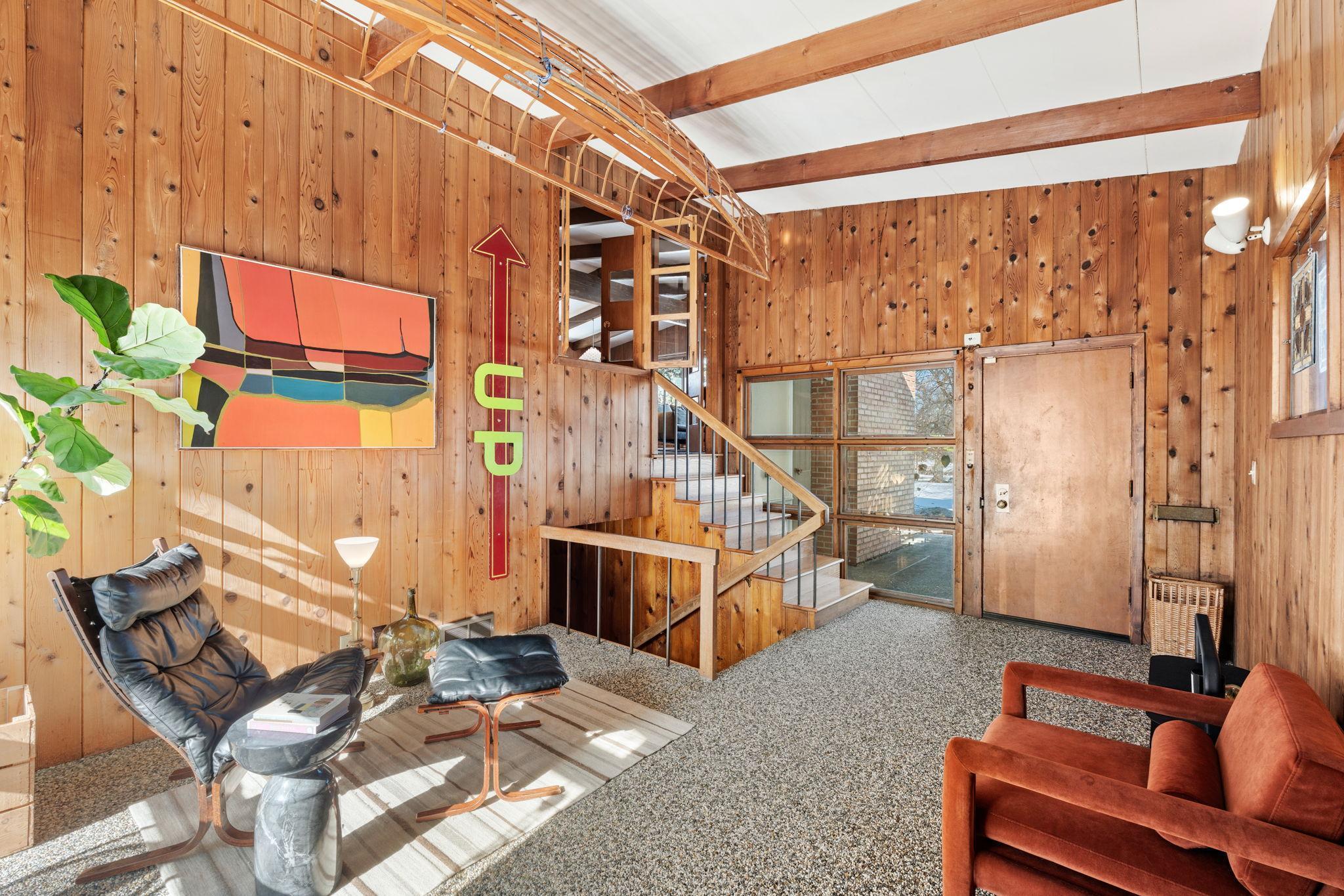 Multiple uses here abound- from breezeway to office to reading area.