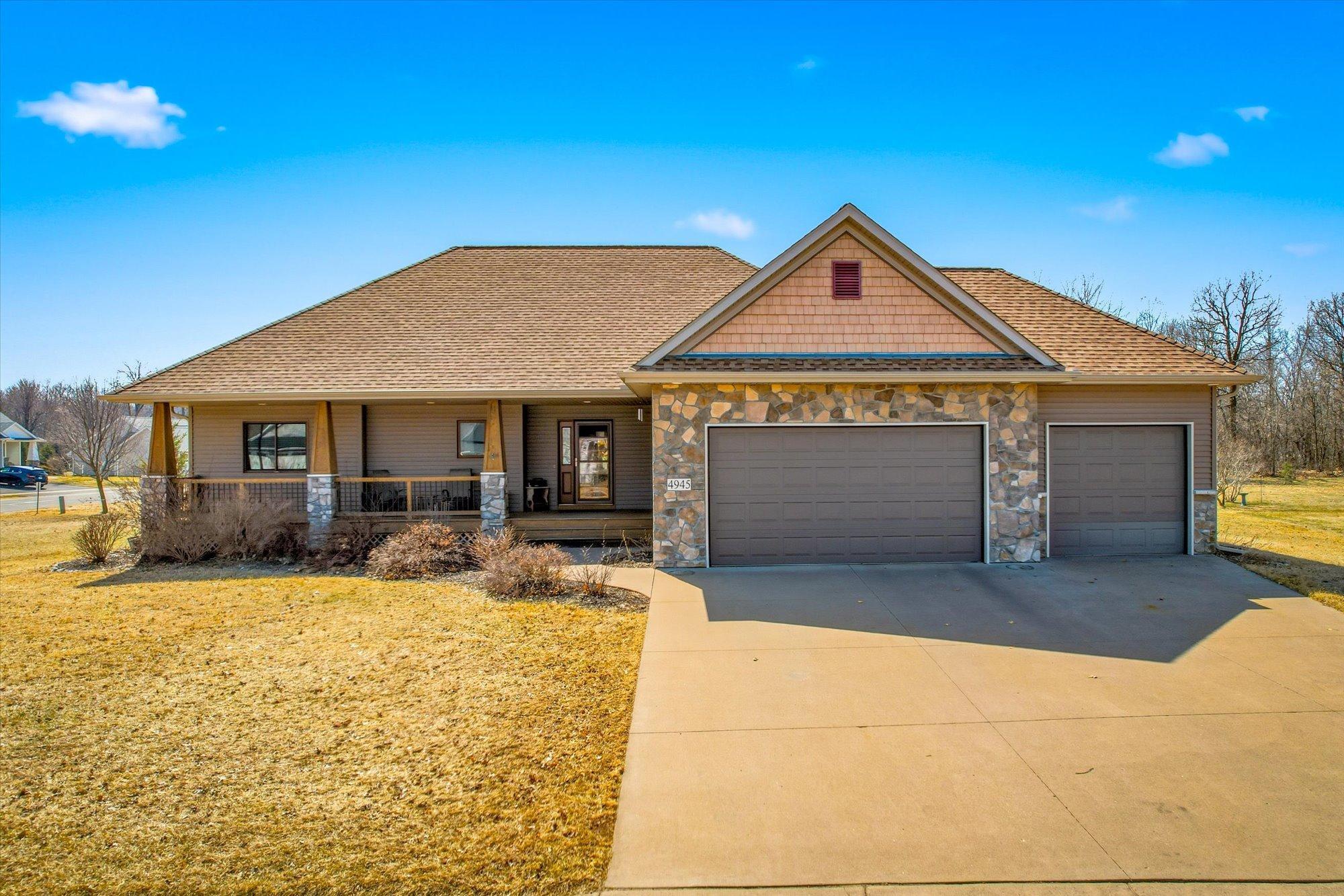 This former model home has an upgraded architectural front facade