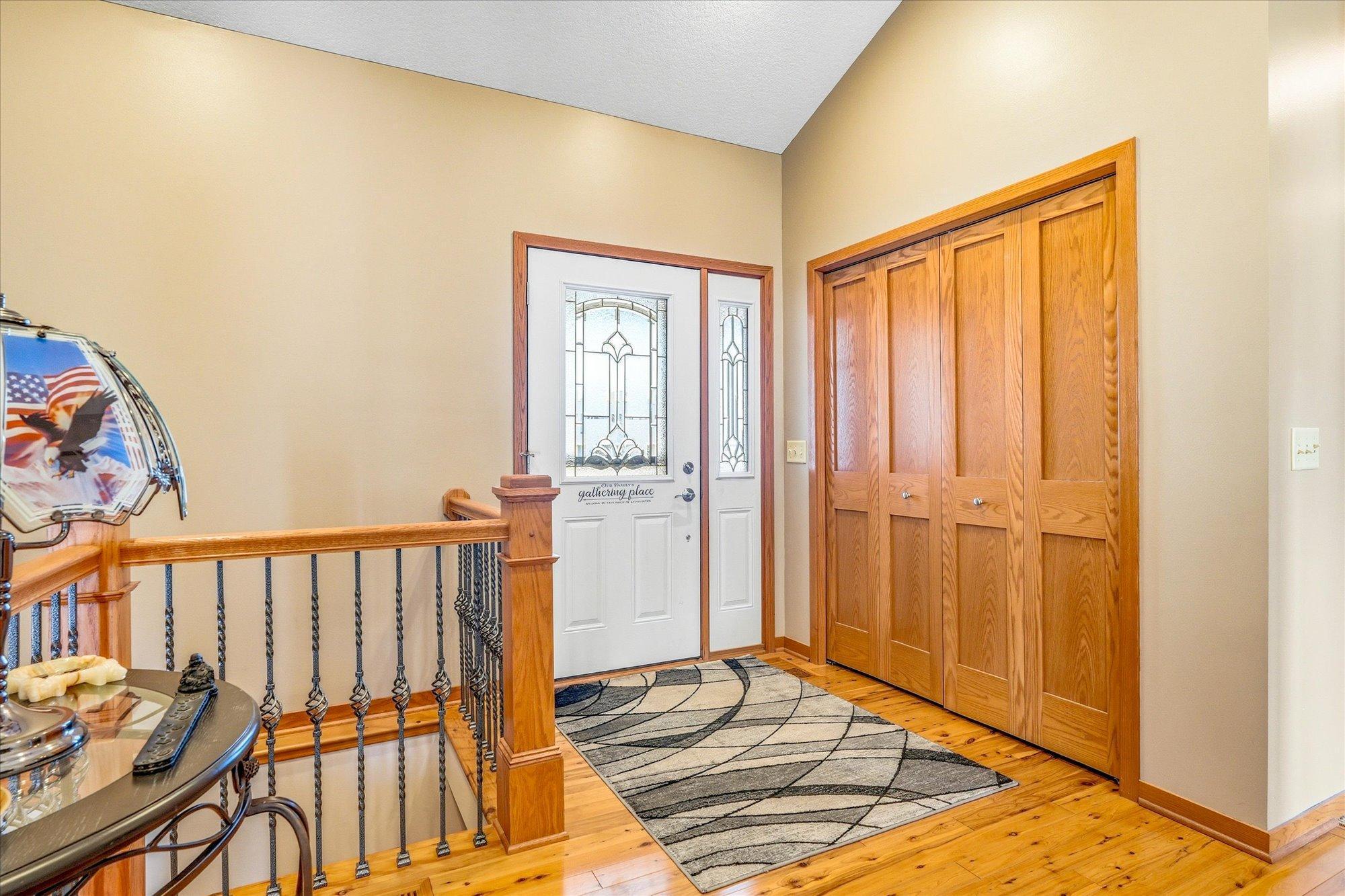 Front entry has a large clothes closet and beautiful hardwood floors