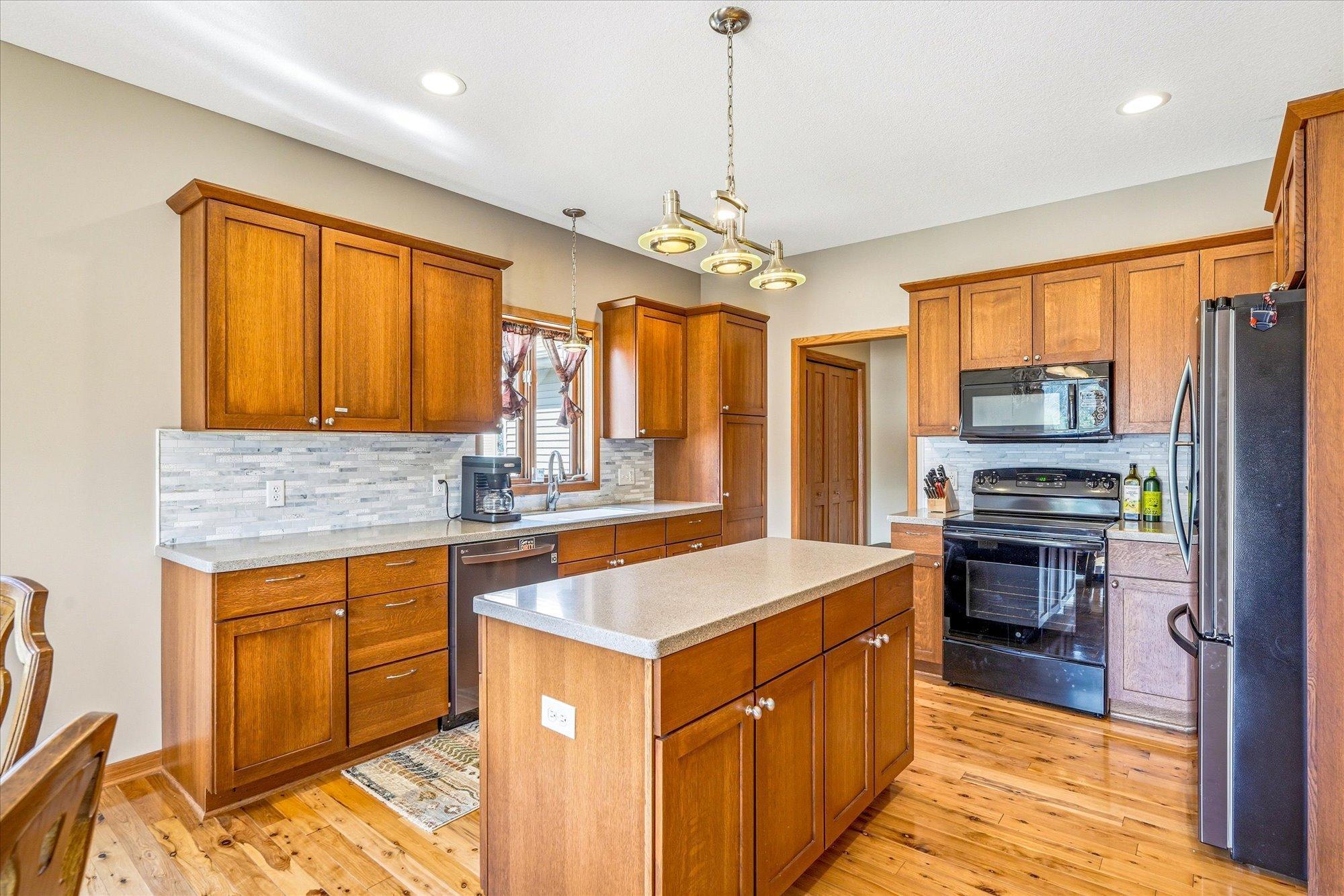 The kitchen features Silestone countertops