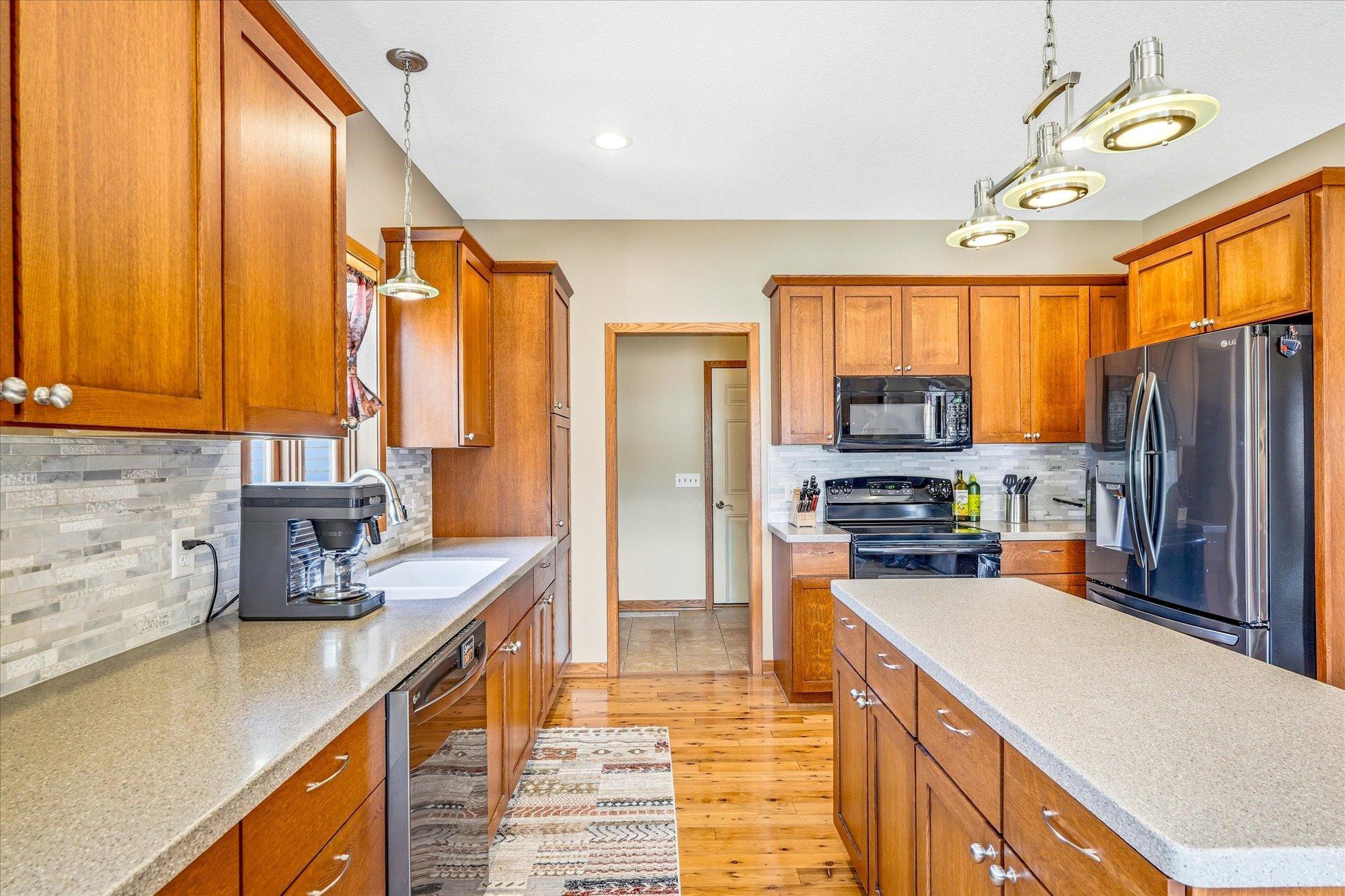 Australian Cypress Flooring throughout kitchen and dining area