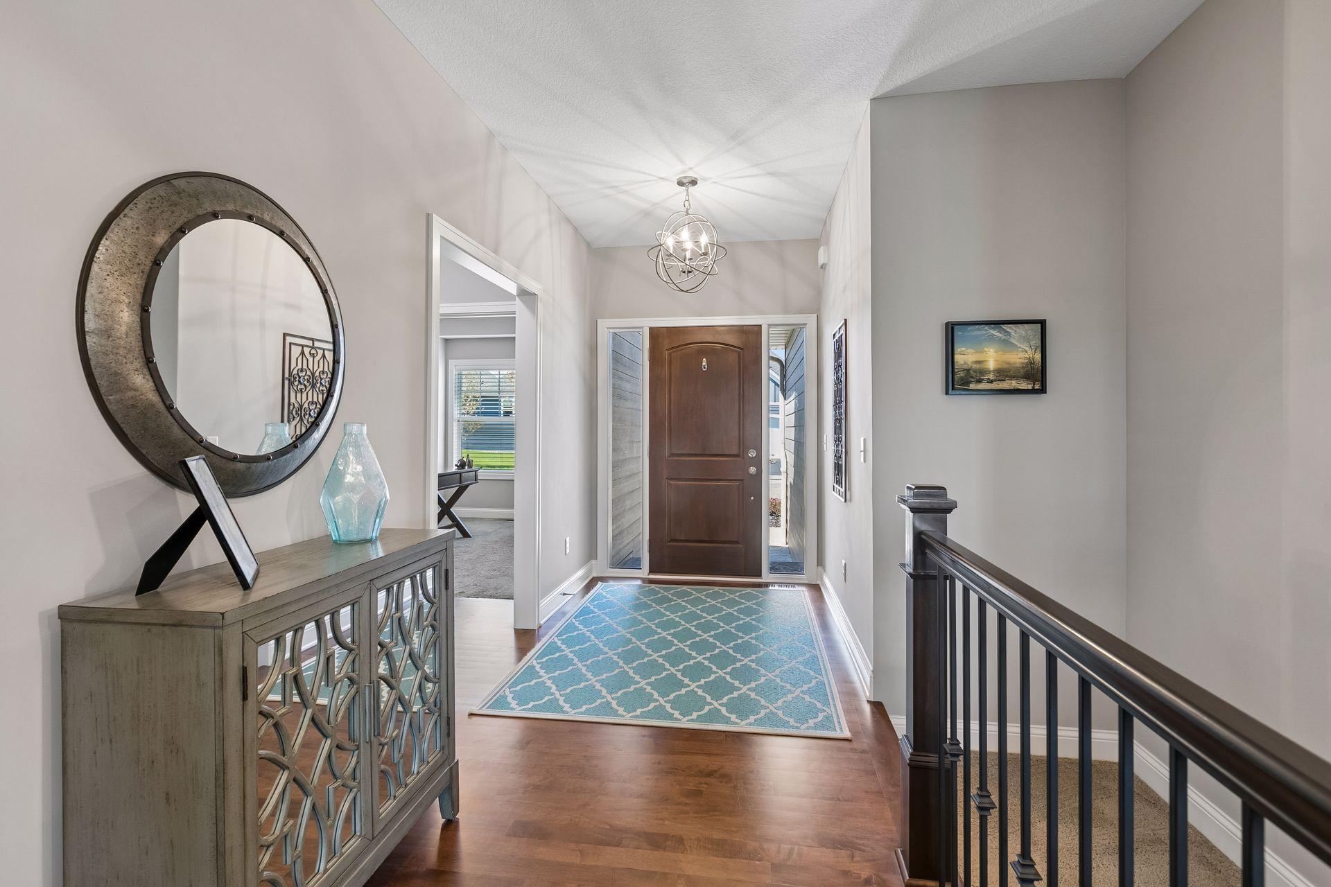 Entry to main level with 2 bds on main, laundry, sun room
