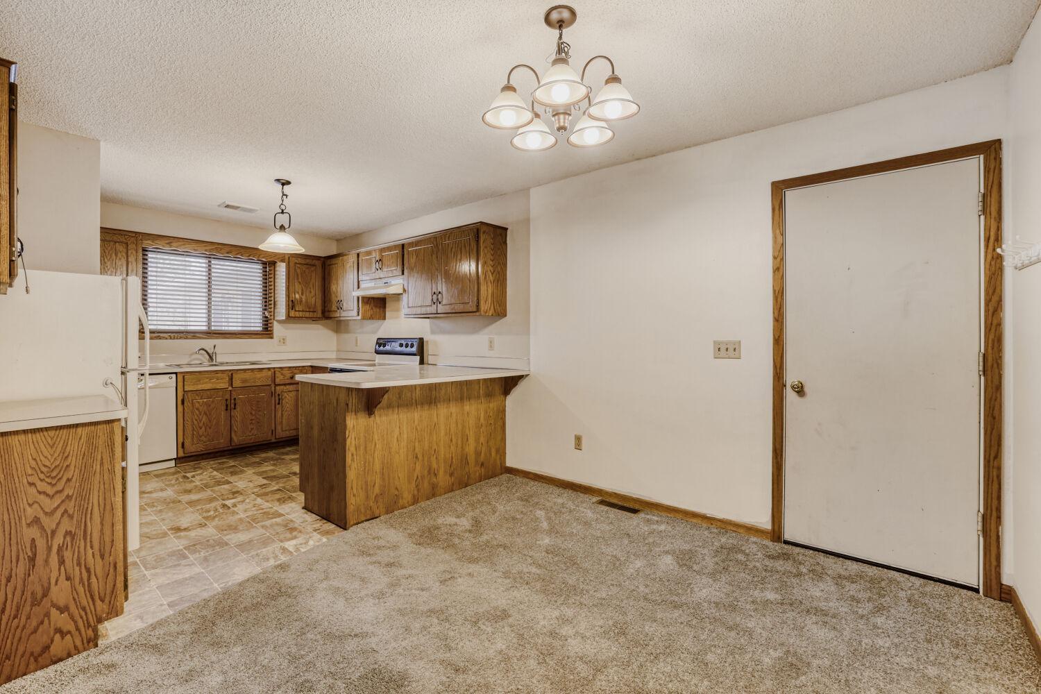 Dining Area Flows Right to Kitchen! Notice The Attached Garage!