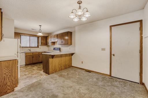 Dining Area Flows Right to Kitchen! Notice The Attached Garage!