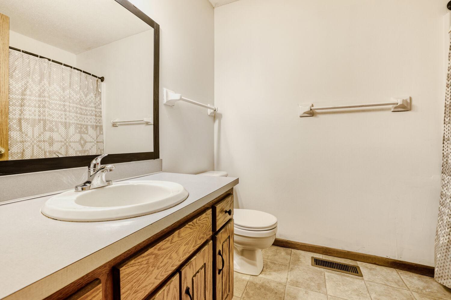 Upper Level Bath Is Fresh and Features New Light Fixtures