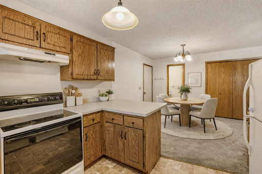 Kitchen is Cozy And Functional - Virtually Staged Again