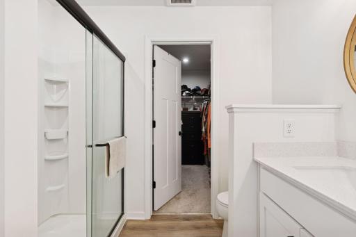 Ensuite shower with oversized walk-in closet.
