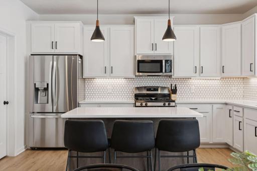 Recently replaced island pendant lights.