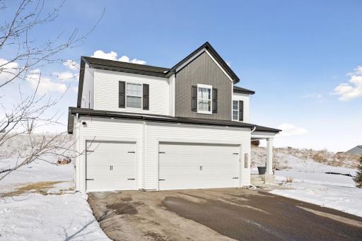 Upgraded 8' insulated garage doors.
