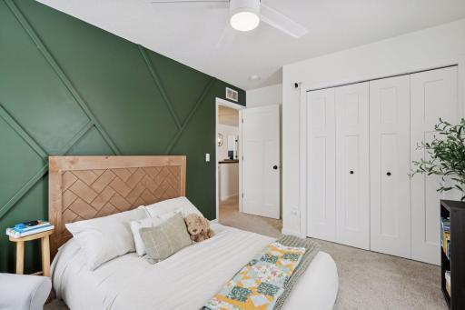Oversized bedroom #2 with decorative accent wall.