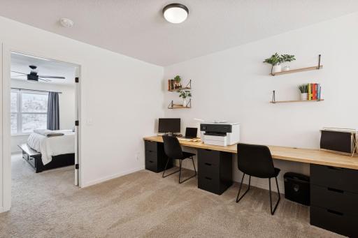 Loft space perfect for flex office space, kids work station, or even reading nook.