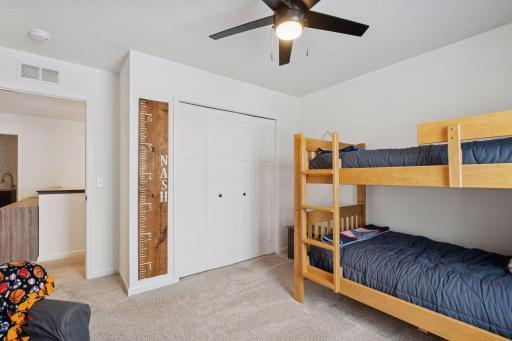 Bedroom #1 with recently installed ceiling fan.