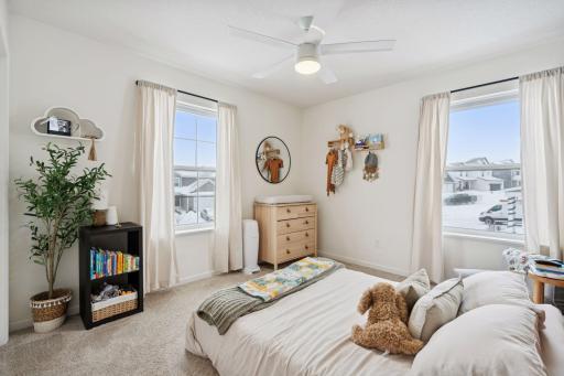 Bedroom #2 with (2) windows overlooking front and side yards.
