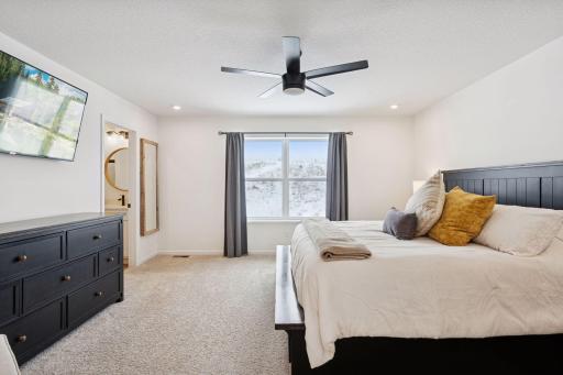 Primary en suite overlooking private back yard.