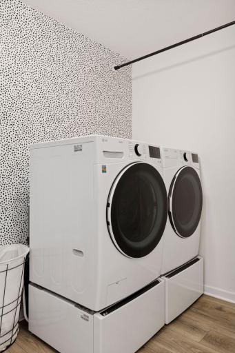 Like new washer and gas dryer with upgraded drawers below.