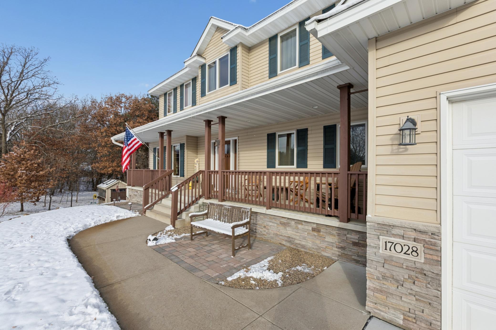 Welcoming front porch invites you to settle in and stay awhile.