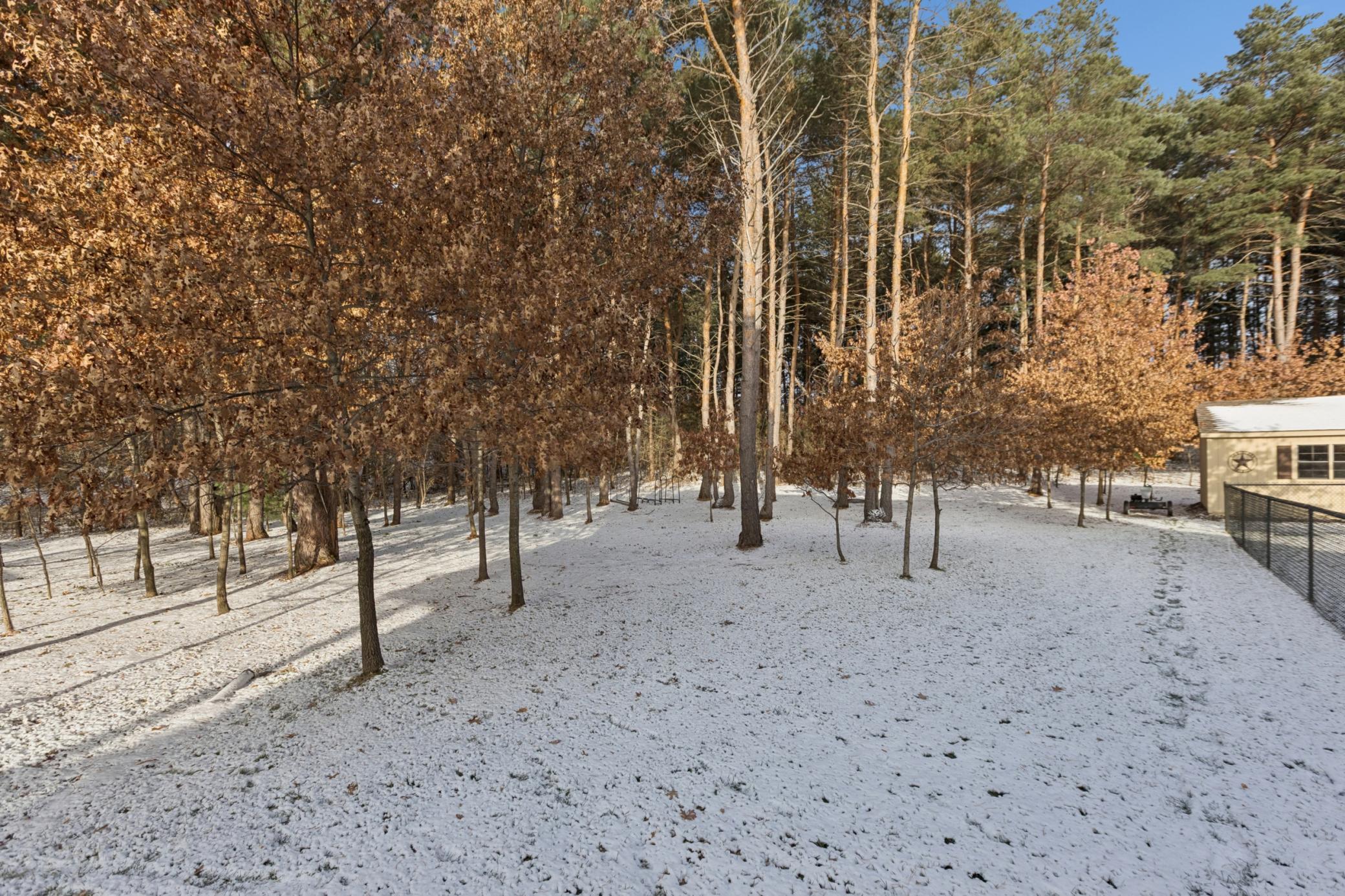Peaceful acreage setting backing up to the Wildlife Refuge.
