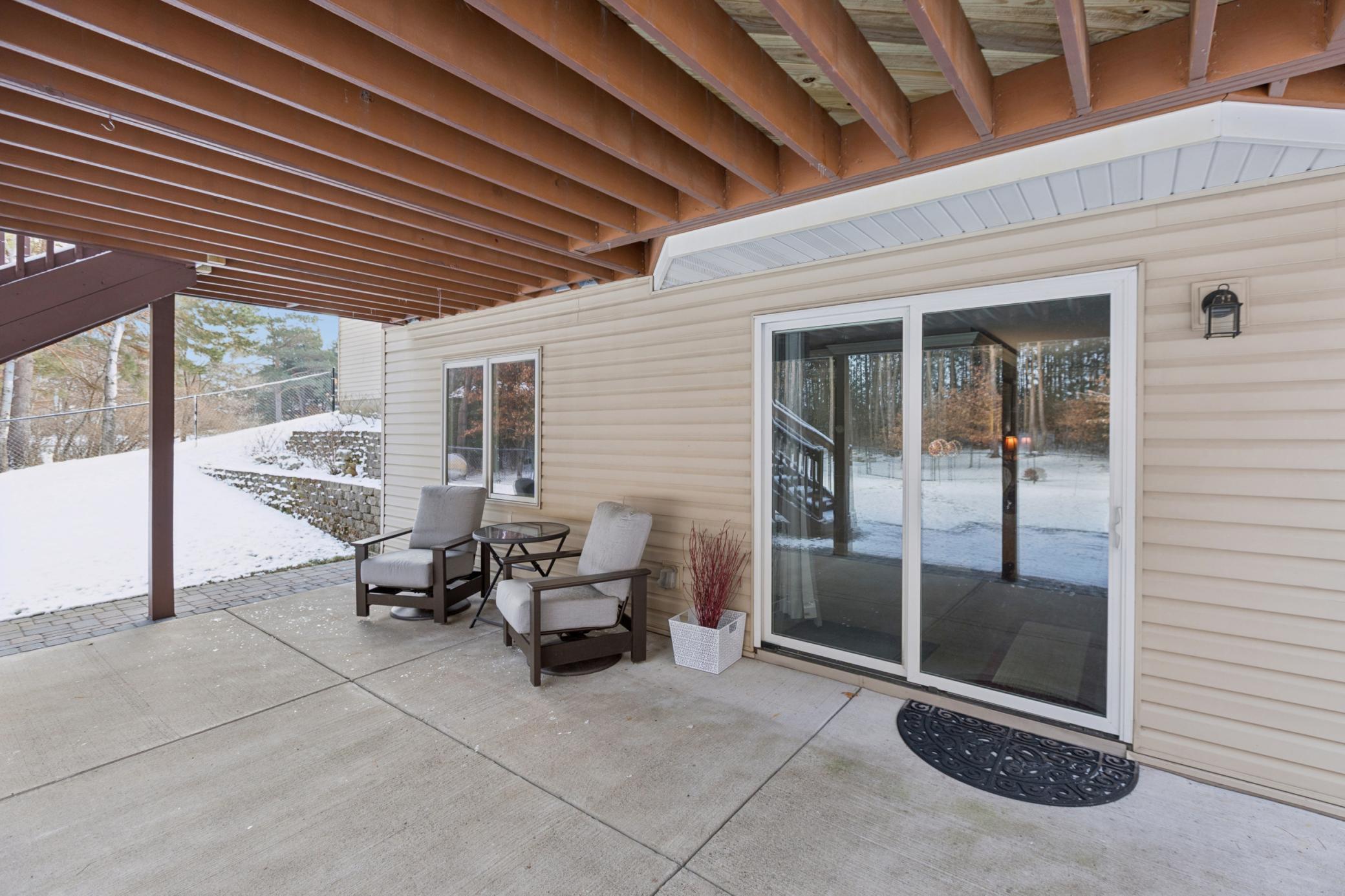 Lower level walks out to the fenced backyard for easy outdoor access.