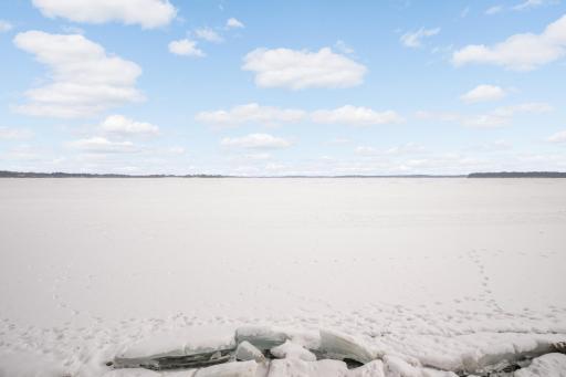 Snowy Lake Minnetonka photo. Anticipation of dock and boating season ahead! Rip-rap shoreline, perfect for enjoying the water while minimizing upkeep.