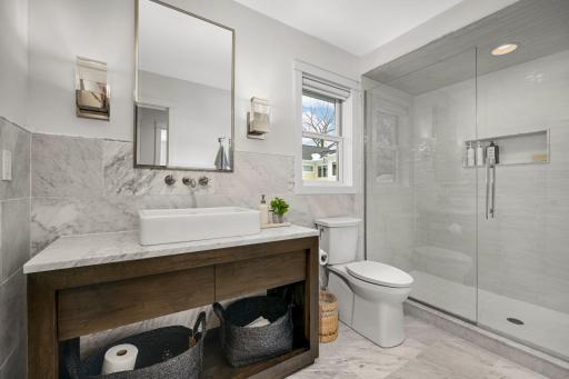 One of three spa-inspired bathrooms on the upper level.