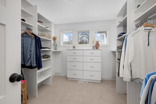 Primary bedroom walk-in closet.