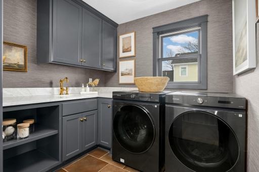 Upper level laundry with newer washer & dryer.