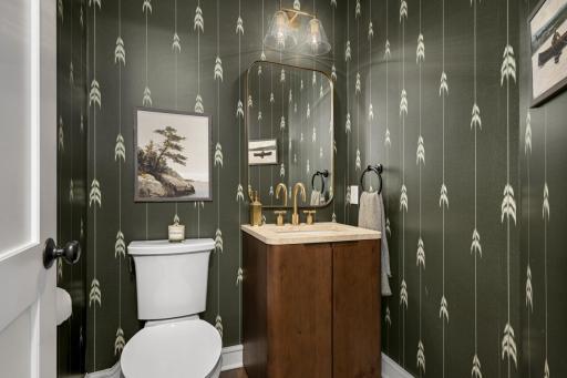 Main level bathroom offering timeless finishes. Perfectly positioned for convenience and guest use.