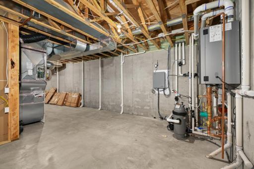 Currently a large storage room. Perfect area for a workout room and bathroom.