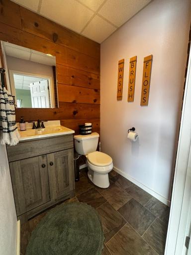 1/2 bath off flex area near side entry