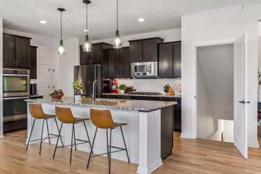 Clean layout with abundant cabinetry.