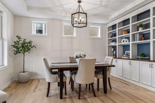 Great as a formal dining area or additional living space. Custom built-ins add both function and style.