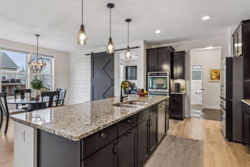 Your kitchen work area is bathed in natural light with the south facing wall of windows.