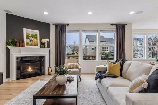 Look at all the natural light! Living room also has built-in speakers in the ceiling.