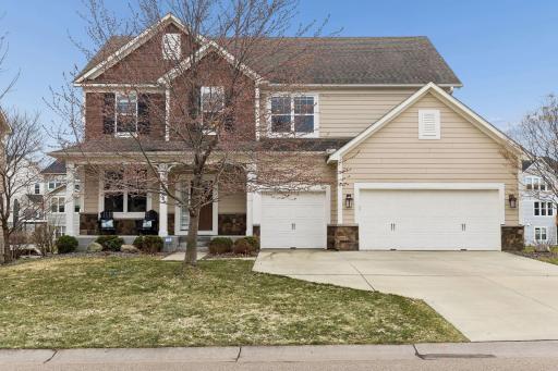 Photo for 1583 Bluewater Lane, Woodbury, MN 55129 - listing #7015587 Classic curb appeal with a welcoming front porch and three-car garage. A home that makes a statement from the street.