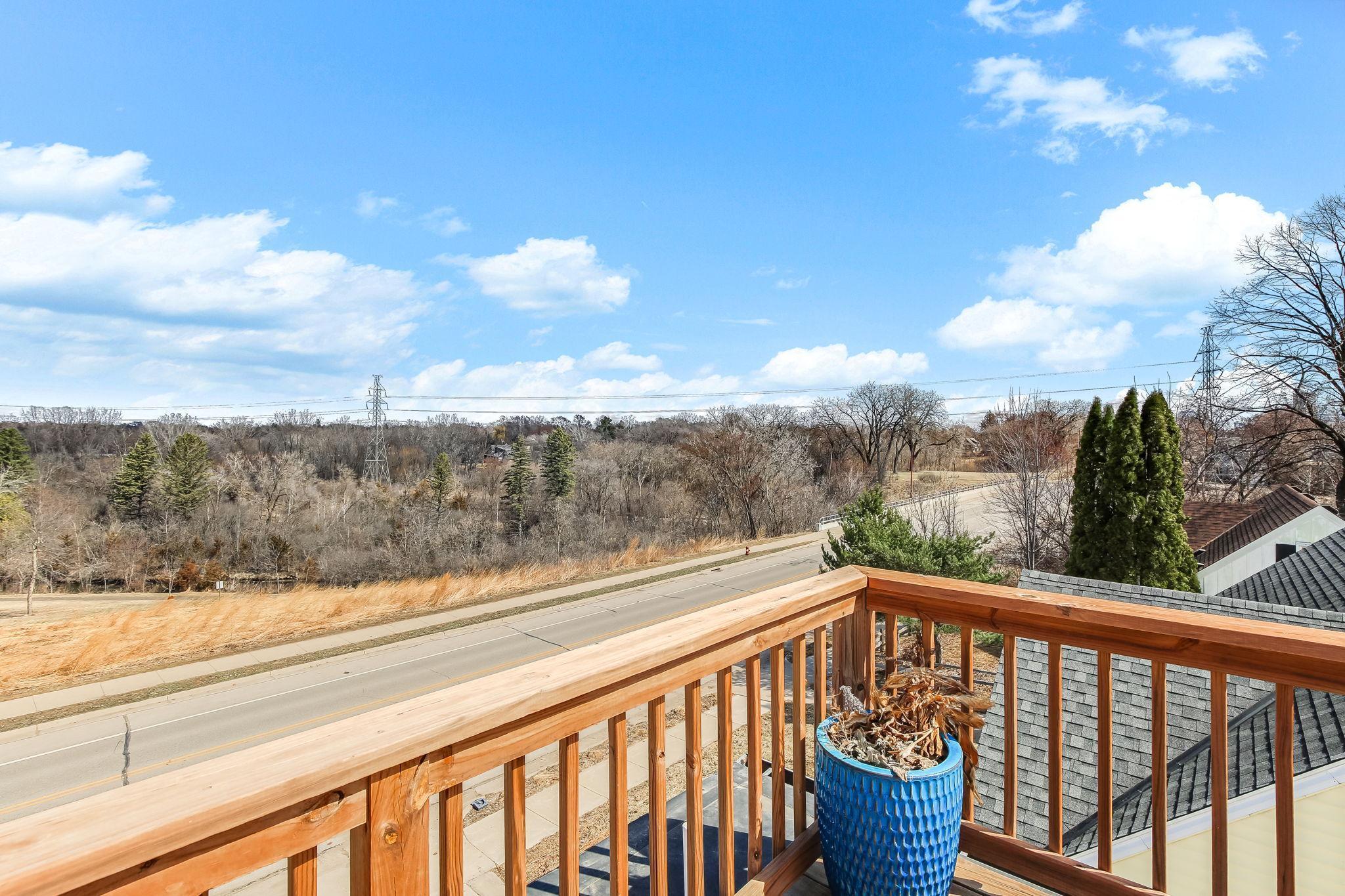 Designed for entertaining, relaxing, and enjoying city and nature views of Theodore Wirth Park.