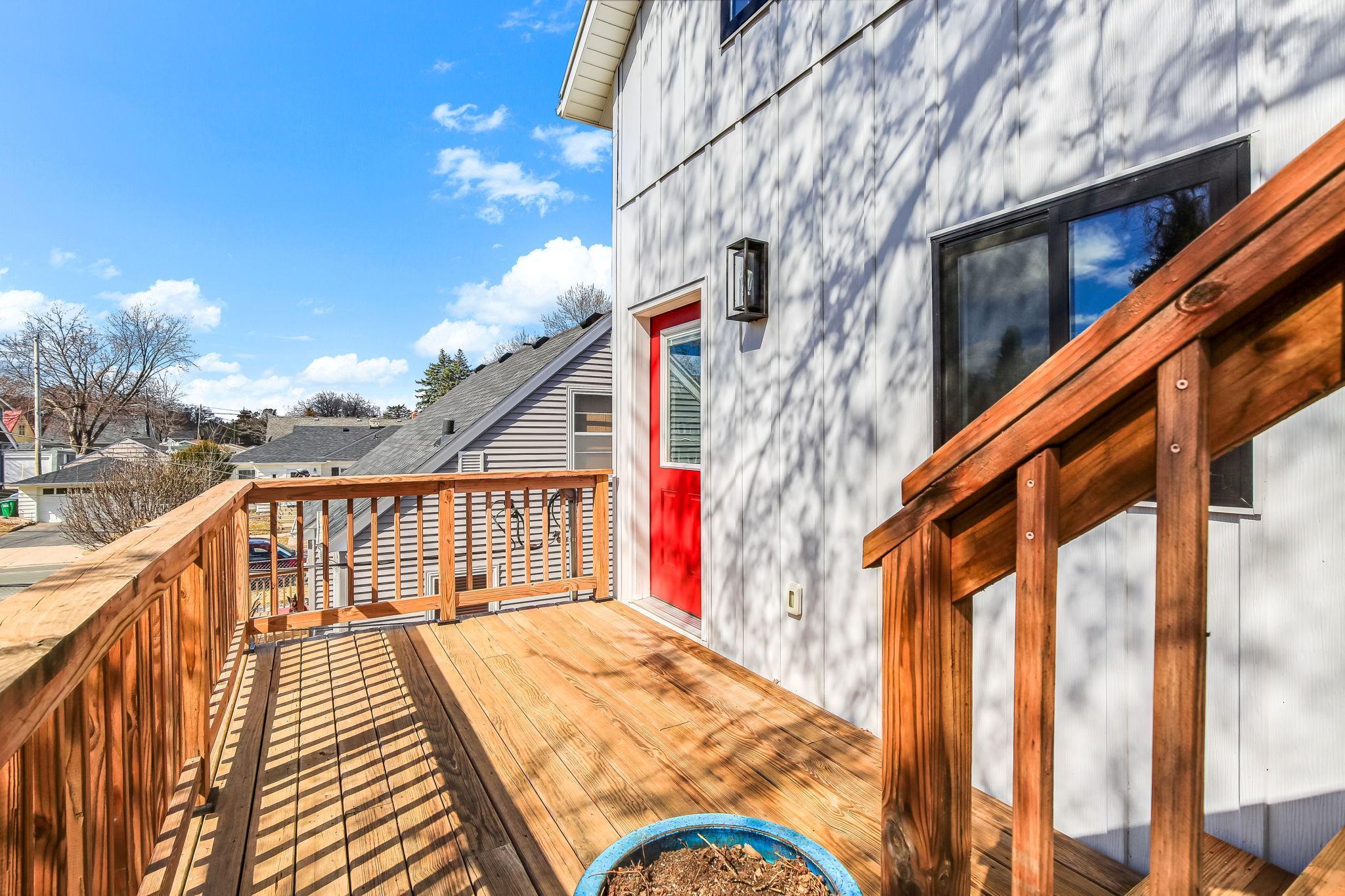 Enjoy seamless outdoor living with a main deck and rooftop deck access