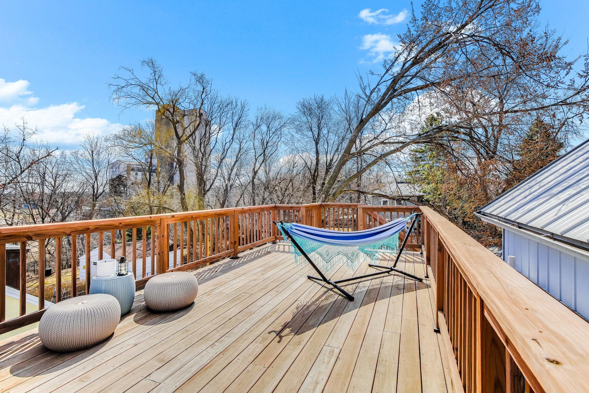 Elevated rooftop deck with stunning views—ideal for gatherings and sunset watching.