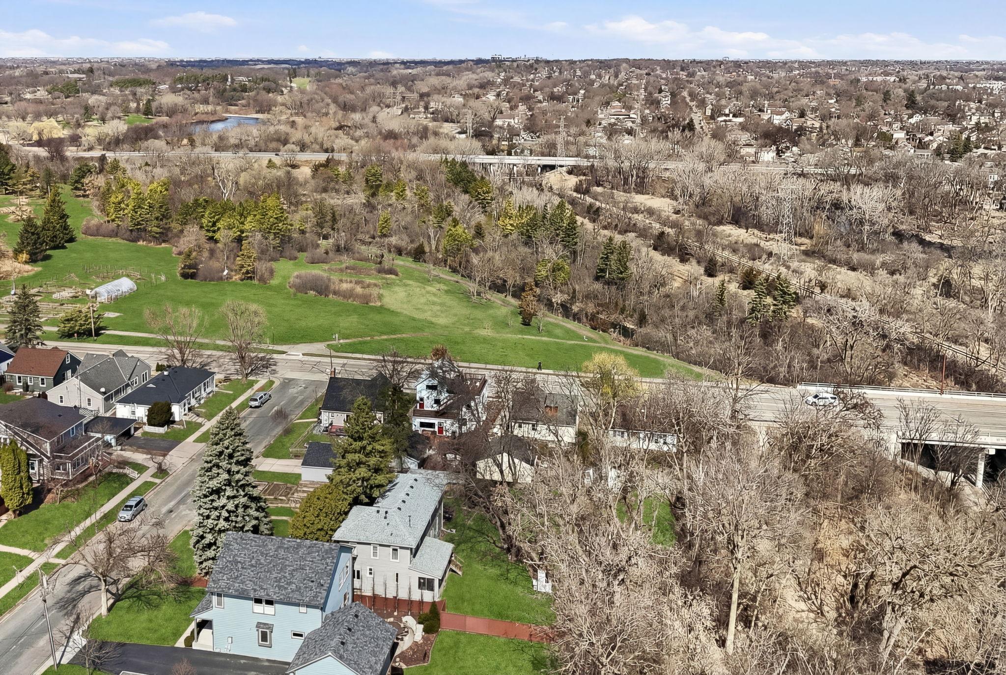 RIGHT ACROSS THE STREET FROM THEODORE WIRTH PARK! Enjoy the best of nature and city life!