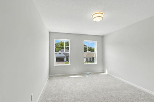 Second Bedroom (Photo of similar home - Colors and selections will vary)