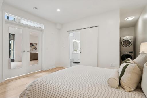 One more thoughtful touch: in-unit laundry tucked within the bedroom suite—stylish and efficient.