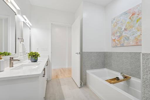 Fall in love with the spa-like primary bath—sleek surfaces, clean lines, and calming natural light throughout.