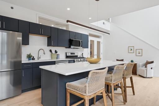 The oversized center island isnât just a showpieceâitâs functional, with built-in electrical for cooking, working, or gathering with ease.