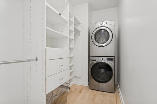 A walk-in closet with built-ins and in-suite laundry. It’s the kind of convenience that sets this home apart.