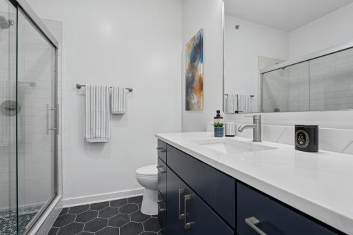 A full bathroom on the upper level keeps things convenient and private for guests or family.